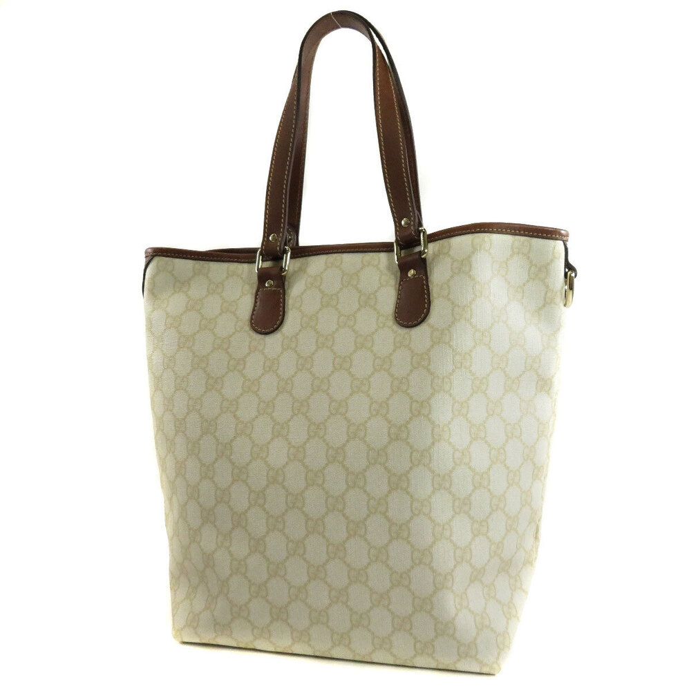 Gucci leather brown GG Supreme handles tote bag